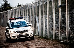 Police_car_at_Hungary-Serbia_border_barrier
